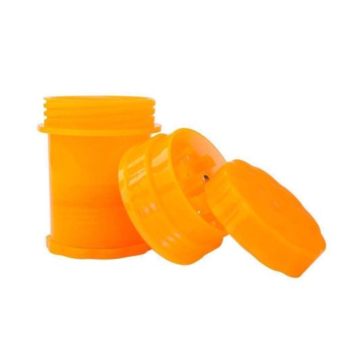 Herb grinder canister container storage smoking accessory with 4 parts made of smooth plastic looks like film canister